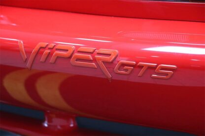 Viper gts logo on a red car.