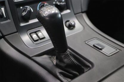 A picture of the gear shift in a car.