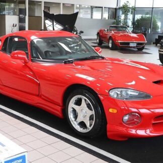 Dodge Viper in red color at a showroom