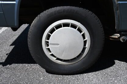 An image of a truck tire with a wheel on it.