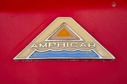 Amphicar logo on a red car.